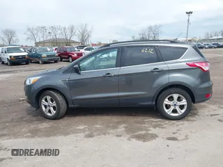 2016 Ford Escape SE with VIN 1FMCU9GX0GUC21749, listed as a IAAI auction lot 42115212 with 149,027 mi miles. Bid and sale history available at carsss.com. Image 14.