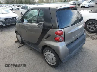 2013 Smart fortwo Pure with VIN WMEEJ3BA6DK653471, listed as a Copart auction lot 51864365 with 129,778 mi miles and Clean Title. Bid and sale history available at DreamBid. Image 2.