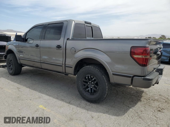 2012 Ford F-150 XL with VIN 1FTFW1ET4CFA59152, listed as a Copart auction lot 51183215 with 142,545 mi miles and Salvage title. Bid and sale history available at DreamBid. Image 2.