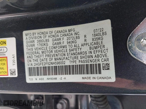 2022 Honda Civic Sedan Sport with VIN 2HGFE2F52NH596002, listed as a IAAI auction lot 41710905 with 33,104 mi miles. Bid and sale history available at carsss.com. Image 9.