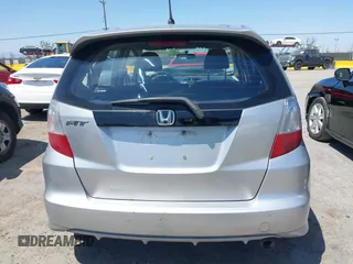 2013 Honda Fit Sport z VIN JHMGE8H56DC009996, wystawiony jako IAAI lot #42349929 z przebiegiem 152 779 mil mil oraz . Historia ofert i sprzedaży dostępna na DreamBid. Obrazek 16.
