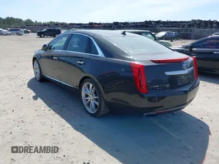 2013 Cadillac XTS Premium with VIN 2G61S5S37D9191353, listed as a IAAI auction lot 41897038 with 79,368 mi miles. Bid and sale history available at carsss.com. Image 3.