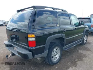 2004 Chevrolet Tahoe Z71 with VIN 1GNEK13ZX4R184775, listed as a IAAI auction lot 42433671 with 77,019 mi miles and . Bid and sale history available at DreamBid. Image 4.