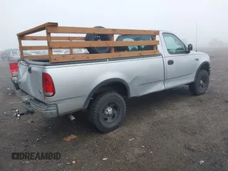 1999 Ford F-150 with VIN 2FTZF1828XCA85643, listed as a IAAI auction lot 41347113 with 173,813 mi miles and . Bid and sale history available at DreamBid. Image 4.
