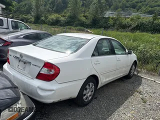 2003 Toyota Camry LE with VIN 4T1BE32K43U207204, listed as a Copart auction lot 57167845 with 189,656 mi miles and Clean Title. Bid and sale history available at DreamBid. Image 4.