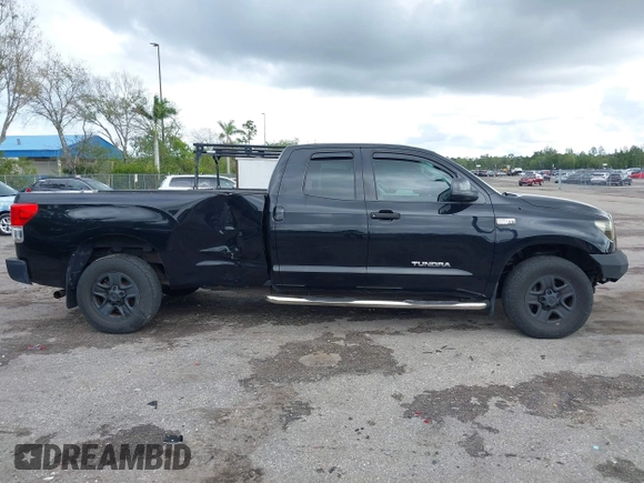 2011 Toyota Tundra 2WD Truck SR with VIN 5TFTY5F14BX007238, listed as a IAAI auction lot 41663289 with 126,499 mi miles. Bid and sale history available at carsss.com. Image 13.