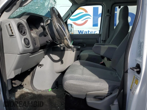 2011 Ford Econoline Passenger XL with VIN 1FBNE3BLXBDA75840, listed as a Copart auction lot 72030614 with 57,183 mi miles and Salvage Title. Bid and sale history available at DreamBid. Image 7.