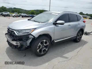 2018 Honda CR-V Touring with VIN 7FARW2H92JE037028, listed as a Copart auction lot 61776845 with 115,042 mi miles and Clean title. Bid and sale history available at DreamBid. Image 1.