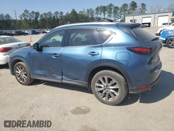 2021 Mazda CX-5 Grand Touring with VIN JM3KFADM0M0391349, listed as a Copart auction lot 48886685 with 38,923 mi miles and Clean Title. Bid and sale history available at carsss.com. Image 2.