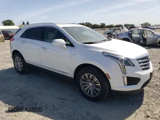 2017 Cadillac XT5 Luxury AWD with VIN 1GYKNDRS0HZ180703, listed as a Copart auction lot 58793895 with 30,339 mi miles and Salvage title. Bid and sale history available at DreamBid. Image 4.