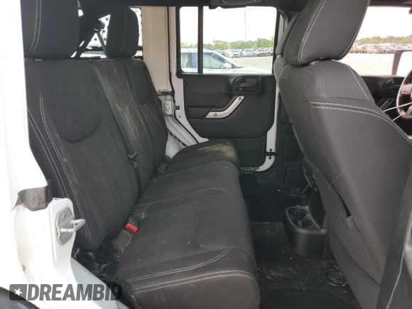 2014 Jeep Wrangler Unlimited Sahara z VIN 1C4BJWEG9EL102336, wystawiony jako Copart lot #55391335 z przebiegiem Nie podano mil oraz Szkoda całkowita • Salvage title. Historia ofert i sprzedaży dostępna na DreamBid. Obrazek 11.