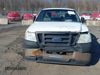 2005 Ford F-150 XL with VIN 1FTRF12285NB41452, listed as a IAAI auction lot 41903892 with 290,233 mi miles. Bid and sale history available at carsss.com. Image 6.