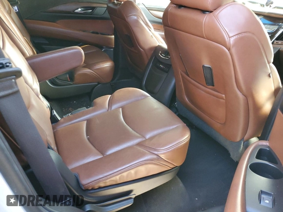 2015 Cadillac Escalade Luxury z VIN 1GYS4MKJ3FR690464, wystawiony jako Copart lot #59001372 z przebiegiem Nie podano mil oraz Szkody całkowita. Historia ofert i sprzedaży dostępna na DreamBid. Obrazek 11.