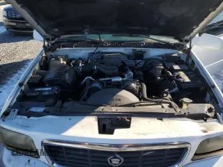 1999 Cadillac Escalade z VIN 1GYEK13R3XR406970, wystawiony jako Copart lot #87623365 z przebiegiem 189 339 mil mil oraz Szkoda całkowita • Salvage title. Historia ofert i sprzedaży dostępna na DreamBid. Obrazek 13.