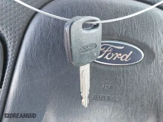 2004 Ford Escape XLT with VIN 1FMCU03134KA96184, listed as a IAAI auction lot 41917091 with 246,067 mi miles. Bid and sale history available at carsss.com. Image 11.