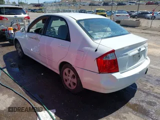 2005 Kia Spectra LX z VIN KNAFE122955121133, wystawiony jako IAAI lot #42434111 z przebiegiem 184 114 mil mil oraz . Historia ofert i sprzedaży dostępna na DreamBid. Obrazek 3.