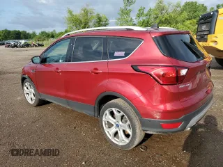 2019 Ford Escape Titanium with VIN 1FMCU0J98KUC00873, listed as a Copart auction lot 61674305 with 53,554 mi miles and Salvage title. Bid and sale history available at DreamBid. Image 2.