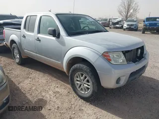 2014 Nissan Frontier SV with VIN 1N6AD0ER0EN759772, listed as a IAAI auction lot 41479252 with 153,630 mi miles and . Bid and sale history available at DreamBid. Image 1.