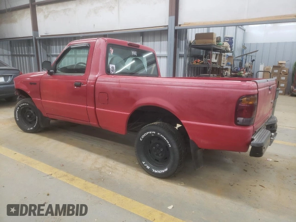 1999 Ford Ranger XL with VIN 1FTYR10C7XUB86230, listed as a Copart auction lot 83654704 with 229,728 mi miles and Salvage Title. Bid and sale history available at DreamBid. Image 2.