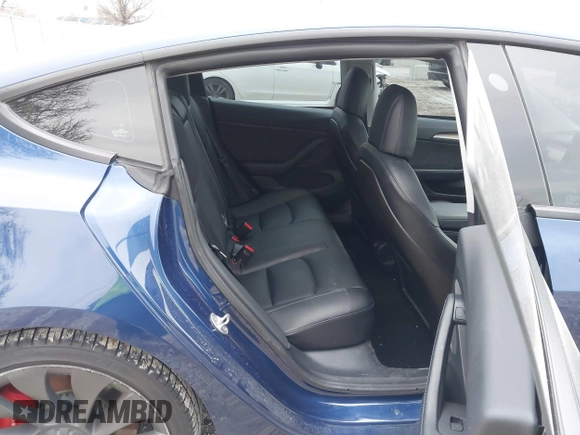 2021 Tesla Model 3 Performance with VIN 5YJ3E1EC6MF996743, listed as a IAAI auction lot 41509631 with 41,599 mi miles and . Bid and sale history available at DreamBid. Image 8.