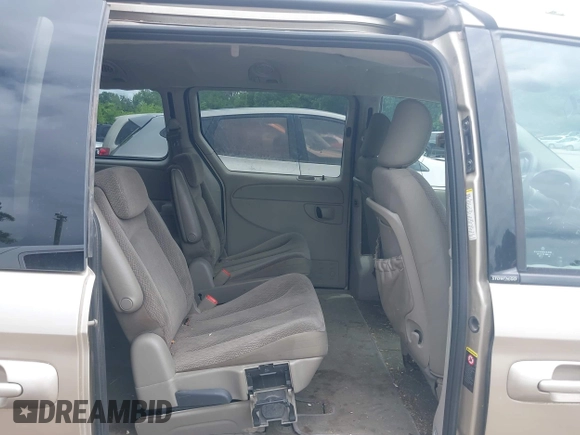 2005 Chrysler Town & Country Touring z VIN 2C8GP54L25R491310, wystawiony jako IAAI lot #42363567 z przebiegiem 203 608 mil mil oraz . Historia ofert i sprzedaży dostępna na DreamBid. Obrazek 8.