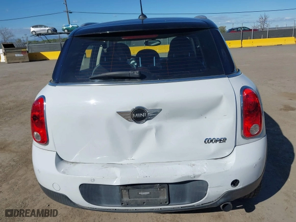 2013 MINI Cooper Countryman with VIN WMWZB3C51DWM31277, listed as a IAAI auction lot 41506486 with 79,006 mi miles. Bid and sale history available at carsss.com. Image 17.
