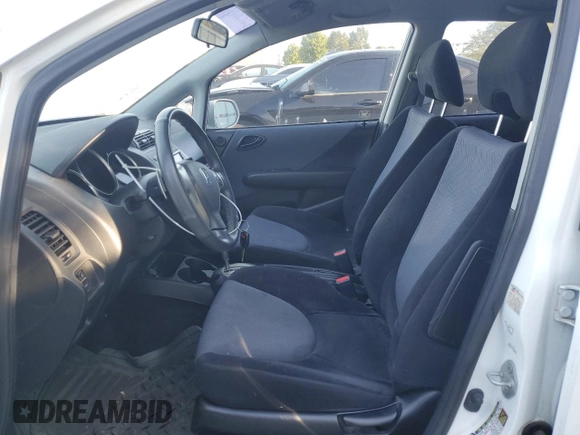 2007 Honda Fit Sport with VIN JHMGD386X7S048180, listed as a Copart auction lot 74252494 with 112,828 mi miles and Salvage Title. Bid and sale history available at carsss.com. Image 7.