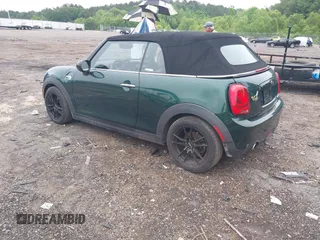 2016 MINI Convertible with VIN WMWWG5C51G3C19231, listed as a IAAI auction lot 42246342 with 93,876 mi miles and . Bid and sale history available at DreamBid. Image 3.