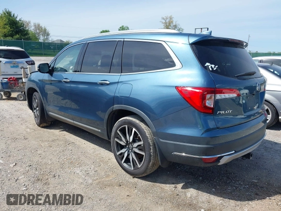 2020 Honda Pilot Touring 8-Passenger with VIN 5FNYF6H93LB034009, listed as a IAAI auction lot 42090993 with 73,325 mi miles and . Bid and sale history available at carsss.com. Image 3.