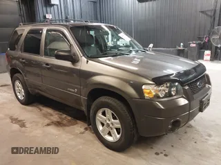 2006 Ford Escape Hybrid z VIN 1FMYU96H76KD56091, wystawiony jako IAAI lot #42678395 z przebiegiem 112 724 mil mil oraz . Historia ofert i sprzedaży dostępna na DreamBid. Obrazek 1.