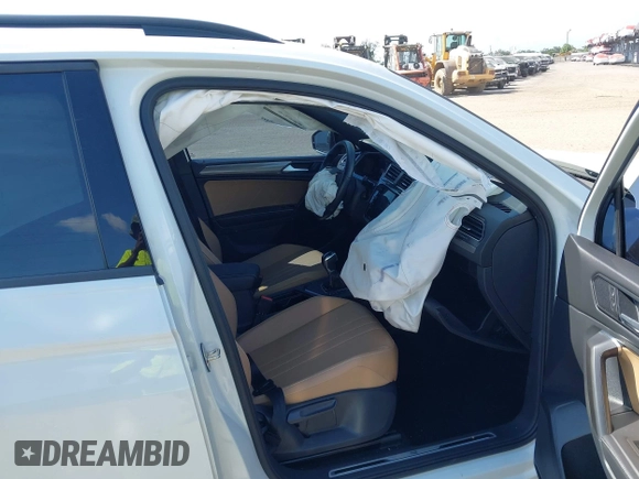 2022 Volkswagen Tiguan SE R-Line Black with VIN 3VVCB7AX5NM009696, listed as a IAAI auction lot 42364884 with 45,380 mi miles and . Bid and sale history available at DreamBid. Image 5.