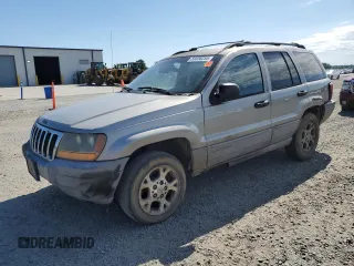2000 Jeep Grand Cherokee Laredo с VIN 1J4G248S7YC321298, выставлен на аукционе Copart как лот 58036255 с пробегом 292 779 миль миль и Списание • Salvage title. История ставок и продаж доступна на DreamBid. Изображение 1.