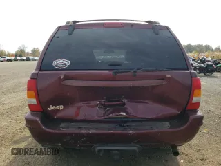 1999 Jeep Grand Cherokee Limited with VIN 1J4GW68S5XC573162, listed as a Copart auction lot 78611274 with 174,960 mi miles and Salvage Title. Bid and sale history available at carsss.com. Image 6.