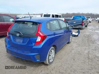 2015 Honda Fit LX with VIN 3HGGK5H52FM710434, listed as a IAAI auction lot 42022022 with 104,118 mi miles. Bid and sale history available at carsss.com. Image 4.