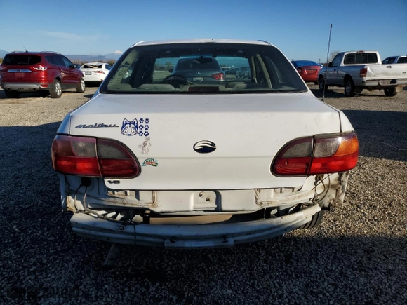 2002 Chevrolet Malibu with VIN 1G1ND52J32M650653, listed as a Copart auction lot 83057574 with 290,370 mi miles and Salvage Title. Bid and sale history available at carsss.com. Image 6.