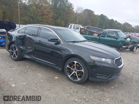 2015 Ford Taurus SHO with VIN 1FAHP2KT7FG148444, listed as a IAAI auction lot 40788614 with 121,533 mi miles and . Bid and sale history available at DreamBid. Image 1.