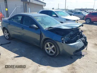 2006 Pontiac G6 6-Cyl z VIN 1G2ZG558264278824, wystawiony jako IAAI lot #42255250 z przebiegiem 117 111 mil mil oraz . Historia ofert i sprzedaży dostępna na DreamBid. Obrazek 1.