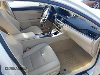 2014 Lexus ES with VIN JTHBK1GG2E2116094, listed as a IAAI auction lot 41728294 with 92,036 mi miles and . Bid and sale history available at carsss.com. Image 5.