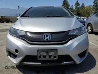 2015 Honda Fit LX с VIN 3HGGK5G59FM723604, выставлен на аукционе Copart как лот 58594315 с пробегом 137 251 миль миль и Чистый • Clean title. История ставок и продаж доступна на DreamBid. Изображение 5.