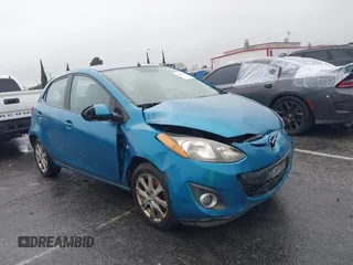 2012 Mazda 2 Touring z VIN JM1DE1LZ2C0140476, wystawiony jako IAAI lot #41557046 z przebiegiem 184 006 mil mil oraz . Historia ofert i sprzedaży dostępna na DreamBid. Obrazek 1.