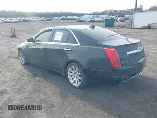 2015 Cadillac CTS Luxury AWD with VIN 1G6AX5SX3F0130311, listed as a IAAI auction lot 41299375 with 134,793 mi miles and . Bid and sale history available at DreamBid. Image 3.
