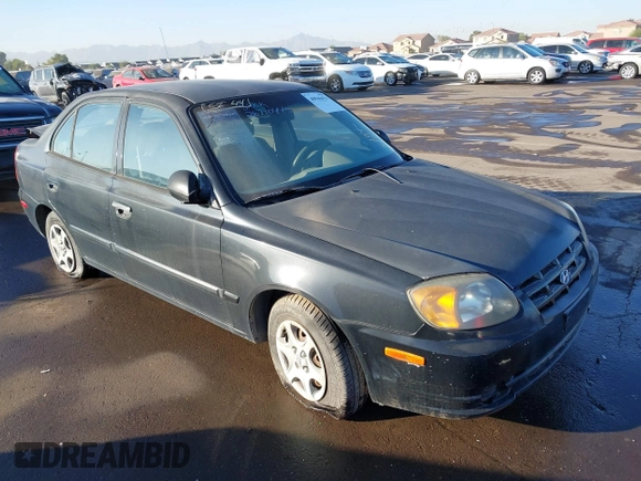 2005 Hyundai Accent GLS with VIN KMHCG45C75U632587, listed as a IAAI auction lot 40946829 with 114,666 mi miles. Bid and sale history available at carsss.com. Image 1.