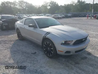 2012 Ford Mustang Premium with VIN 1ZVBP8AM7C5288124, listed as a IAAI auction lot 42280797 with 188,223 mi miles and . Bid and sale history available at DreamBid. Image 1.