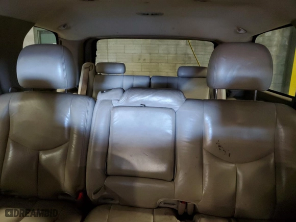 2003 GMC Yukon SLT with VIN 1GKEK13Z63J304047, listed as a Copart auction lot 77318644 with 252,484 mi miles and Salvage Title. Bid and sale history available at carsss.com. Image 10.