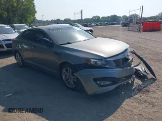 2012 Kia Optima SX with VIN 5XXGR4A63CG004478, listed as a IAAI auction lot 40039813 with 151,248 mi miles and . Bid and sale history available at carsss.com. Image 1.
