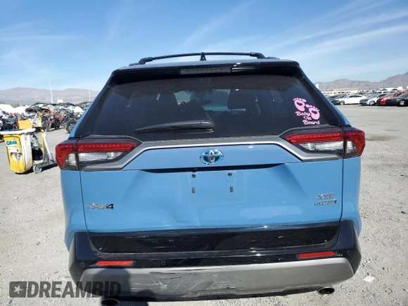 2023 Toyota RAV4 Hybrid XSE with VIN 2T3E6RFV4PW039496, listed as a Copart auction lot 39150774 with 13,533 mi miles and Salvage title. Bid and sale history available at DreamBid. Image 6.