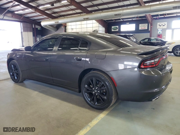 2022 Dodge Charger SXT with VIN 2C3CDXJGXNH143471, listed as a Copart auction lot 48845235 with 74,262 mi miles and Salvage Title. Bid and sale history available at carsss.com. Image 2.