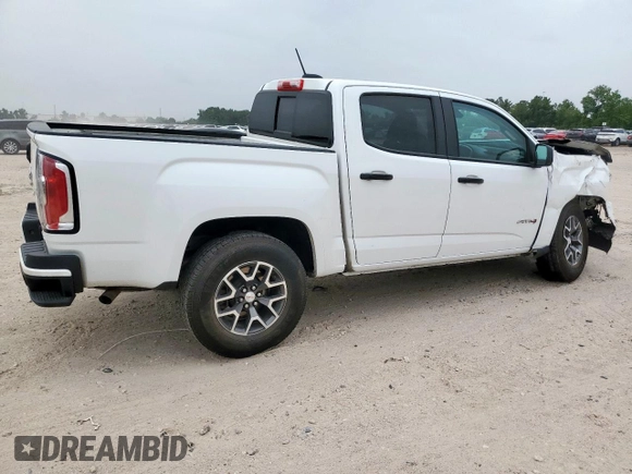 2022 GMC Canyon 4WD AT4 z VIN 1GTG6FEN2N1210072, wystawiony jako Copart lot #57084565 z przebiegiem 64 897 mil mil oraz Szkoda całkowita • Salvage title. Historia ofert i sprzedaży dostępna na DreamBid. Obrazek 3.