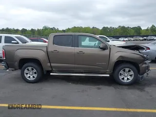 2015 GMC Canyon 2WD SLE with VIN 1GTG5BE38F1229799, listed as a IAAI auction lot 41944801 with 71,165 mi miles. Bid and sale history available at carsss.com. Image 13.