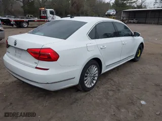2016 Volkswagen Passat 1.8T SE w/Technology with VIN 1VWBS7A30GC013454, listed as a IAAI auction lot 41477109 with 134,027 mi miles. Bid and sale history available at carsss.com. Image 4.